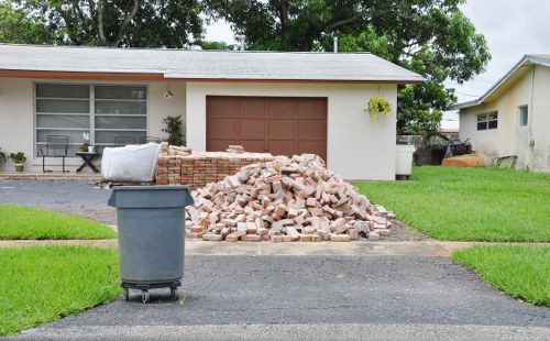 Workers sorting demolition waste materials
